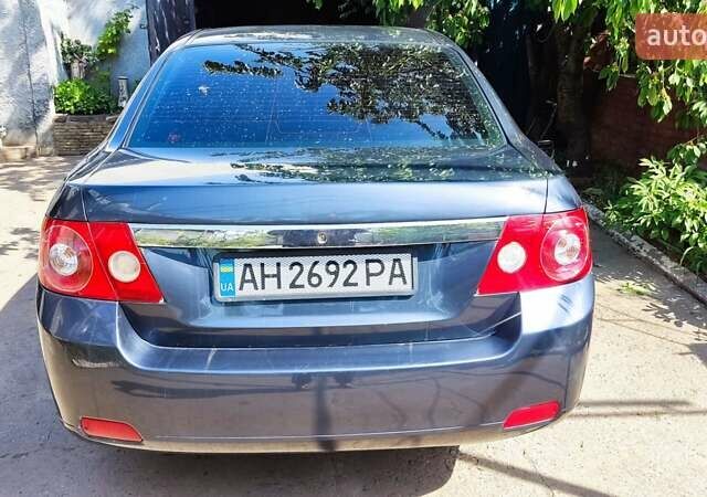 Сірий Шевроле Епіка, об'ємом двигуна 1.99 л та пробігом 280 тис. км за 5500 $, фото 23 на Automoto.ua