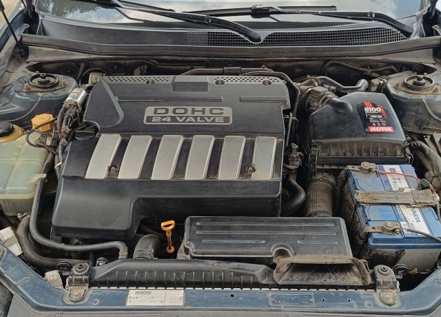 Серый Шевроле Эпика, объемом двигателя 2.5 л и пробегом 195 тыс. км за 5500 $, фото 3 на Automoto.ua