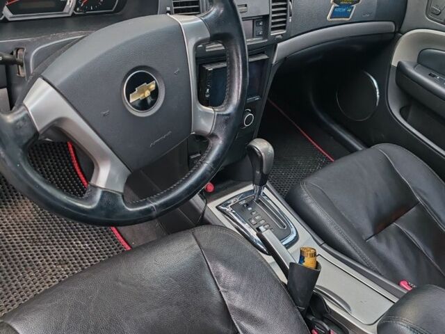 Серый Шевроле Эпика, объемом двигателя 2.5 л и пробегом 213 тыс. км за 3898 $, фото 7 на Automoto.ua