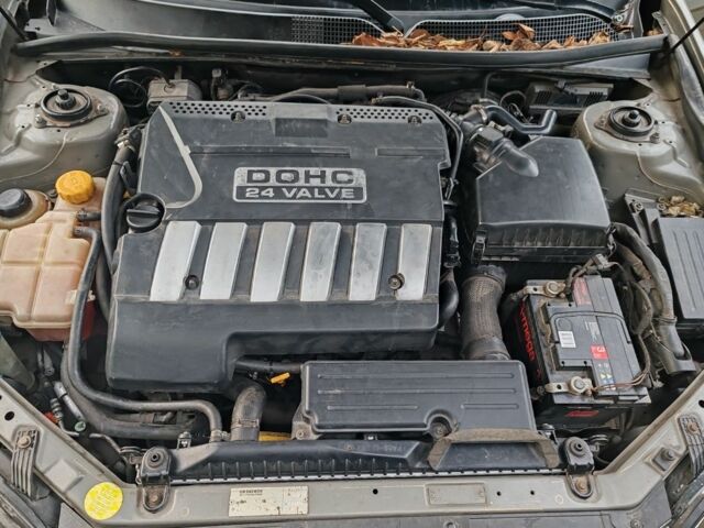 Серый Шевроле Эпика, объемом двигателя 2.5 л и пробегом 213 тыс. км за 3898 $, фото 3 на Automoto.ua