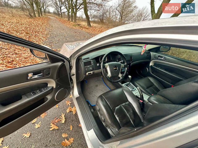 Серый Шевроле Эпика, объемом двигателя 2.49 л и пробегом 245 тыс. км за 3999 $, фото 19 на Automoto.ua