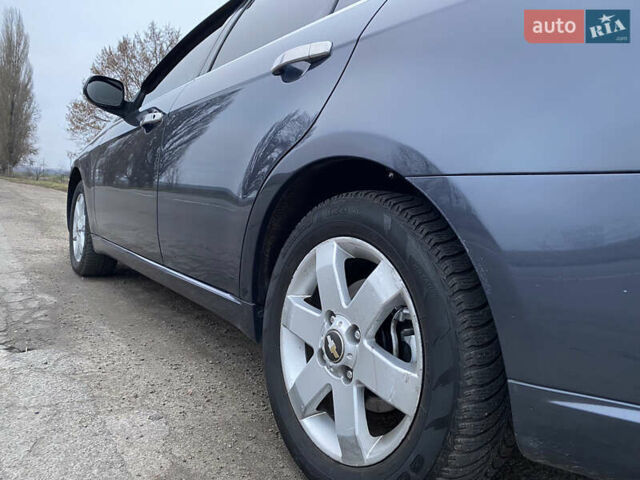 Сірий Шевроле Епіка, об'ємом двигуна 1.99 л та пробігом 207 тис. км за 4800 $, фото 13 на Automoto.ua