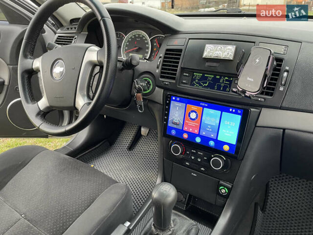 Серый Шевроле Эпика, объемом двигателя 2 л и пробегом 250 тыс. км за 5600 $, фото 18 на Automoto.ua