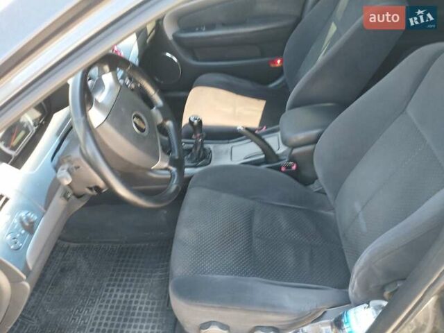 Сірий Шевроле Епіка, об'ємом двигуна 2 л та пробігом 240 тис. км за 3900 $, фото 2 на Automoto.ua