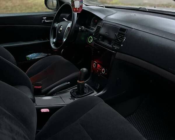 Серый Шевроле Эпика, объемом двигателя 2 л и пробегом 179 тыс. км за 5000 $, фото 10 на Automoto.ua