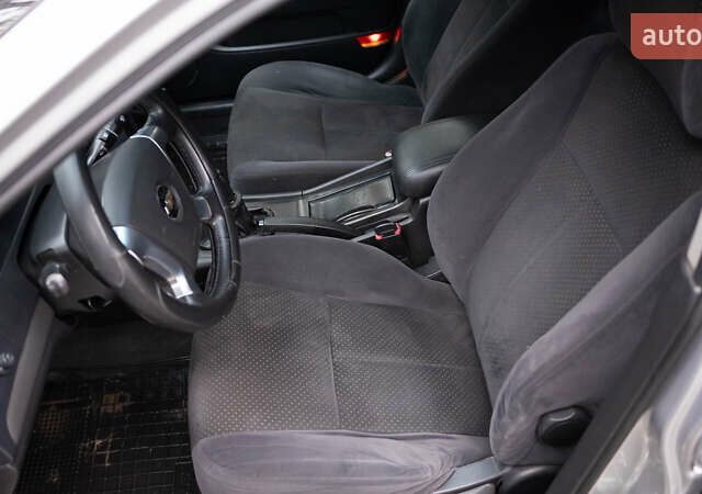 Серый Шевроле Эпика, объемом двигателя 1.99 л и пробегом 180 тыс. км за 4000 $, фото 8 на Automoto.ua