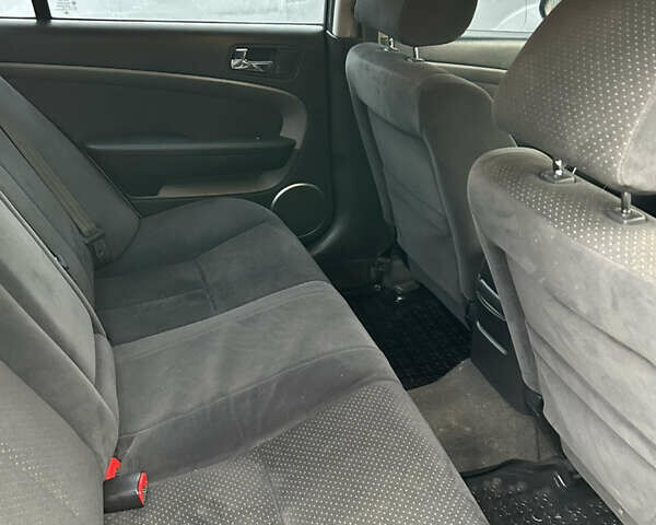 Сірий Шевроле Епіка, об'ємом двигуна 2 л та пробігом 151 тис. км за 4700 $, фото 10 на Automoto.ua