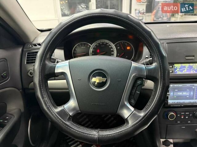 Серый Шевроле Эпика, объемом двигателя 2.5 л и пробегом 311 тыс. км за 4490 $, фото 19 на Automoto.ua