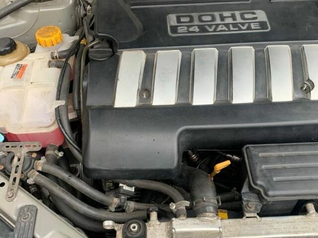 Серый Шевроле Эпика, объемом двигателя 2.5 л и пробегом 220 тыс. км за 5500 $, фото 3 на Automoto.ua