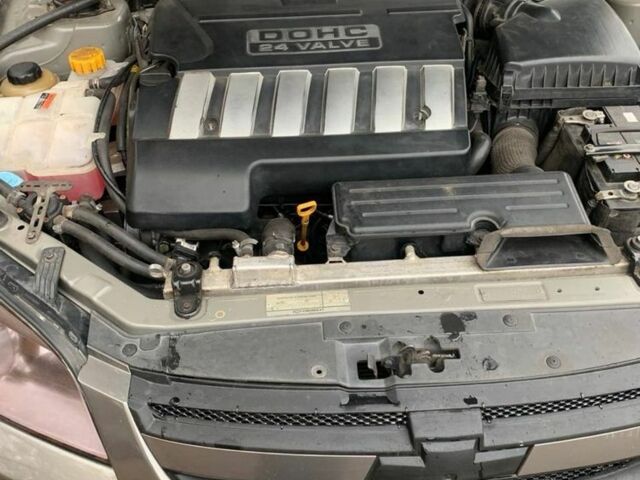 Серый Шевроле Эпика, объемом двигателя 2.5 л и пробегом 220 тыс. км за 5500 $, фото 6 на Automoto.ua