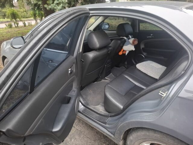 Серый Шевроле Эпика, объемом двигателя 2 л и пробегом 310 тыс. км за 6500 $, фото 6 на Automoto.ua