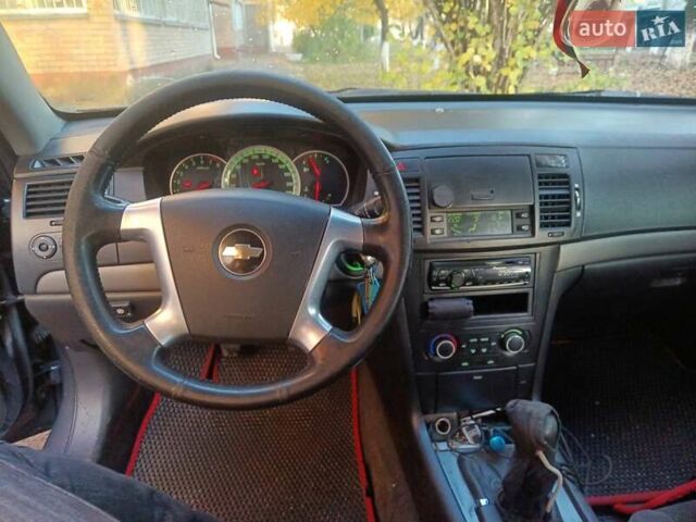 Синий Шевроле Эпика, объемом двигателя 1.99 л и пробегом 352 тыс. км за 4500 $, фото 11 на Automoto.ua