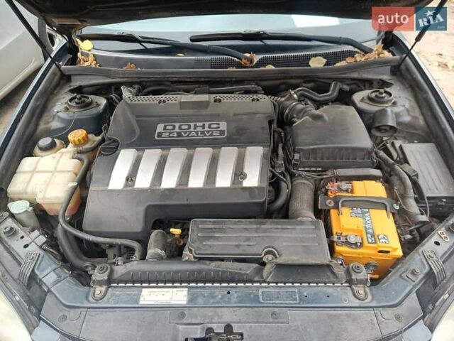 Синий Шевроле Эпика, объемом двигателя 1.99 л и пробегом 352 тыс. км за 4500 $, фото 6 на Automoto.ua