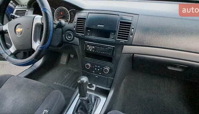 Синій Шевроле Епіка, об'ємом двигуна 1.99 л та пробігом 203 тис. км за 5000 $, фото 13 на Automoto.ua