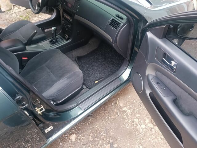 Зелений Шевроле Епіка, об'ємом двигуна 2 л та пробігом 220 тис. км за 4300 $, фото 4 на Automoto.ua