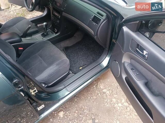 Зелений Шевроле Епіка, об'ємом двигуна 2 л та пробігом 220 тис. км за 4300 $, фото 4 на Automoto.ua