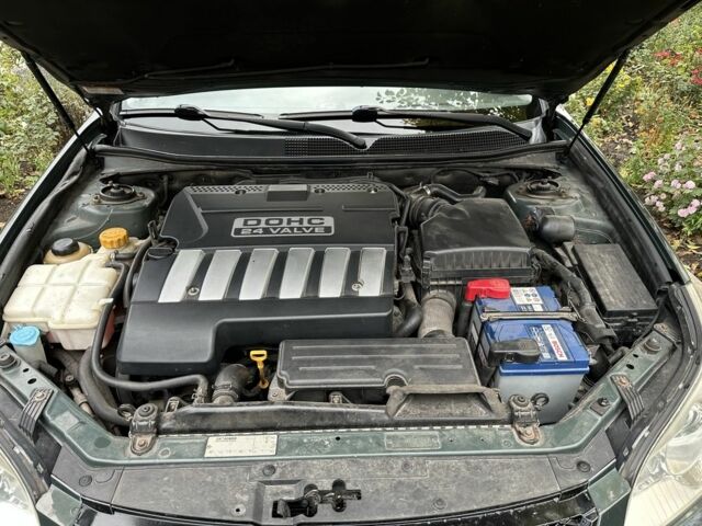 Зеленый Шевроле Эпика, объемом двигателя 2 л и пробегом 189 тыс. км за 2900 $, фото 6 на Automoto.ua