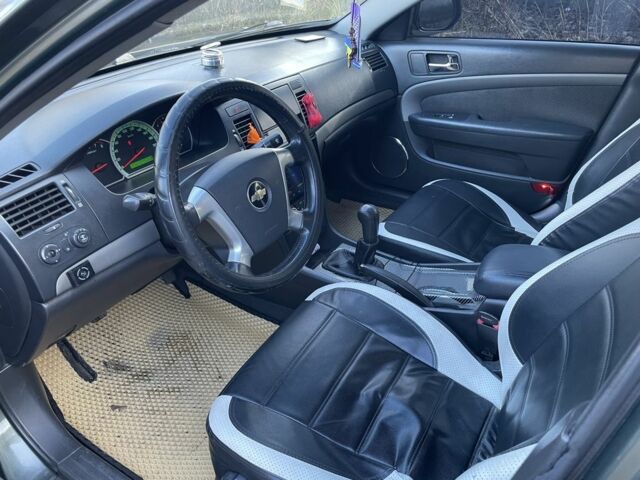 Зелений Шевроле Епіка, об'ємом двигуна 2 л та пробігом 236 тис. км за 4300 $, фото 5 на Automoto.ua