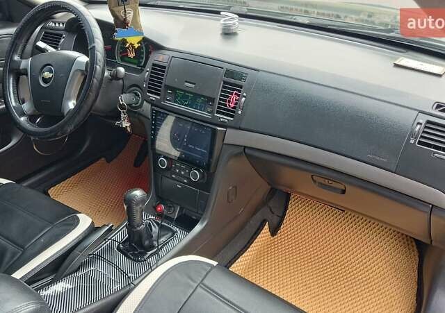 Зеленый Шевроле Эпика, объемом двигателя 1.99 л и пробегом 245 тыс. км за 4400 $, фото 15 на Automoto.ua