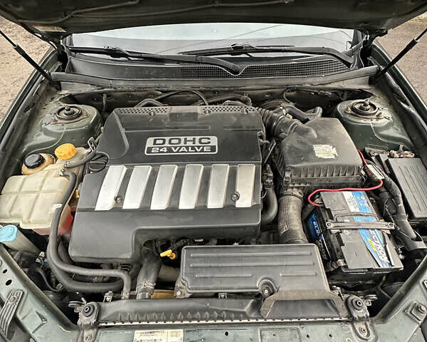 Зелений Шевроле Епіка, об'ємом двигуна 1.99 л та пробігом 255 тис. км за 5500 $, фото 18 на Automoto.ua