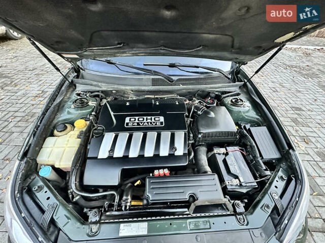 Зеленый Шевроле Эпика, объемом двигателя 2.5 л и пробегом 162 тыс. км за 4299 $, фото 25 на Automoto.ua