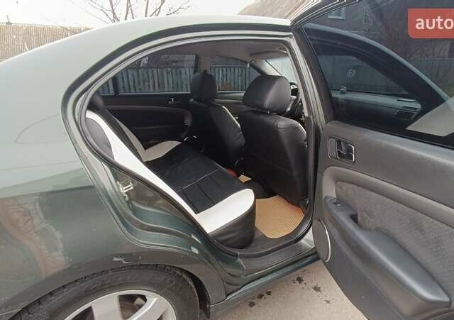 Зеленый Шевроле Эпика, объемом двигателя 1.99 л и пробегом 245 тыс. км за 4400 $, фото 12 на Automoto.ua