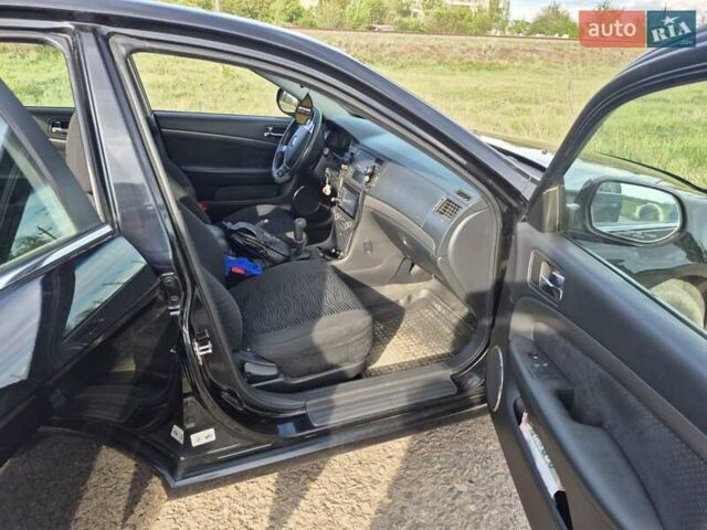 Зеленый Шевроле Эпика, объемом двигателя 2 л и пробегом 51 тыс. км за 7500 $, фото 26 на Automoto.ua