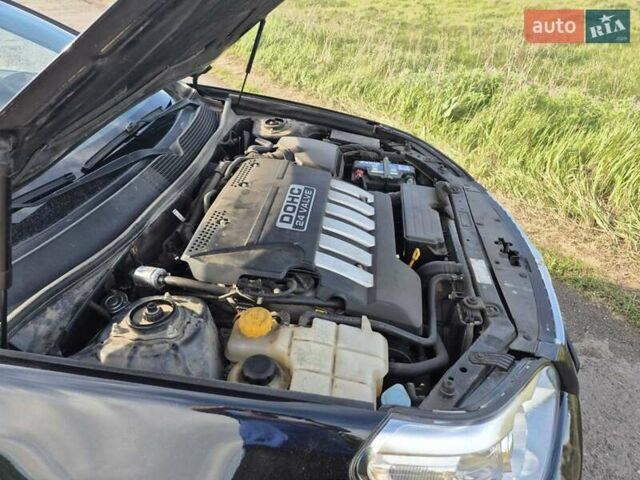 Зеленый Шевроле Эпика, объемом двигателя 2 л и пробегом 51 тыс. км за 7500 $, фото 10 на Automoto.ua