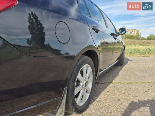 Зеленый Шевроле Эпика, объемом двигателя 2 л и пробегом 51 тыс. км за 7500 $, фото 7 на Automoto.ua