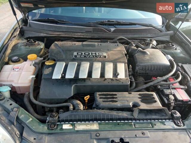 Зеленый Шевроле Эпика, объемом двигателя 2 л и пробегом 230 тыс. км за 4200 $, фото 12 на Automoto.ua