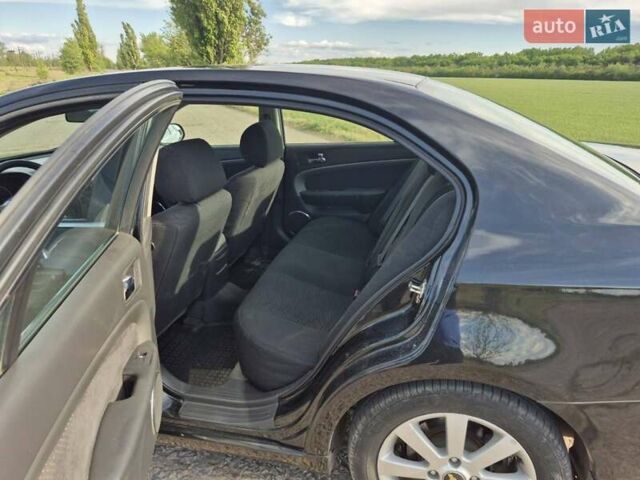Зеленый Шевроле Эпика, объемом двигателя 2 л и пробегом 51 тыс. км за 7500 $, фото 14 на Automoto.ua