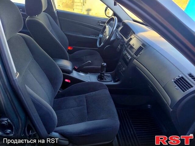 Зеленый Шевроле Эпика, объемом двигателя 2 л и пробегом 104 тыс. км за 5490 $, фото 5 на Automoto.ua