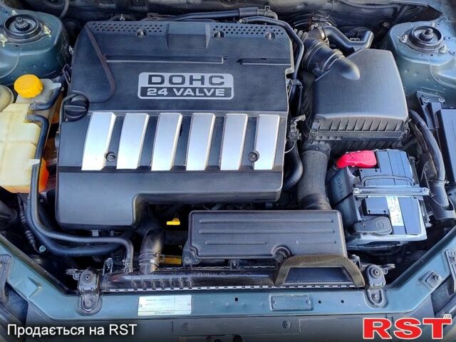 Зеленый Шевроле Эпика, объемом двигателя 2 л и пробегом 104 тыс. км за 5490 $, фото 8 на Automoto.ua