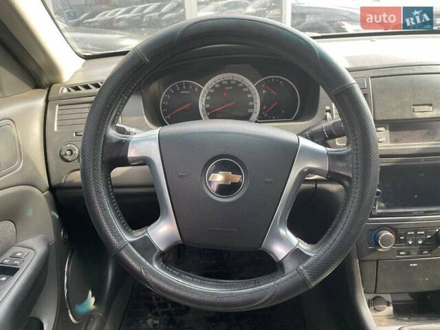 Зелений Шевроле Епіка, об'ємом двигуна 2 л та пробігом 312 тис. км за 5290 $, фото 12 на Automoto.ua