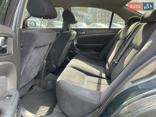 Зелений Шевроле Епіка, об'ємом двигуна 2 л та пробігом 312 тис. км за 5290 $, фото 9 на Automoto.ua