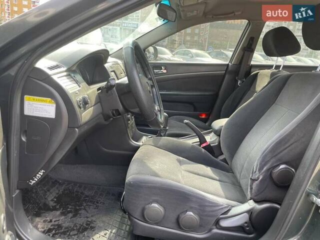 Зелений Шевроле Епіка, об'ємом двигуна 2 л та пробігом 312 тис. км за 5290 $, фото 8 на Automoto.ua