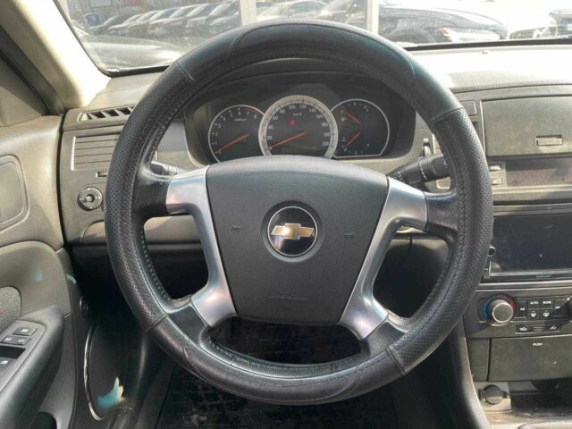 Зелений Шевроле Епіка, об'ємом двигуна 2 л та пробігом 312 тис. км за 5290 $, фото 12 на Automoto.ua