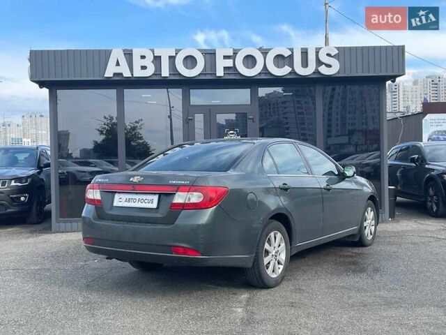 Зелений Шевроле Епіка, об'ємом двигуна 2 л та пробігом 312 тис. км за 5290 $, фото 7 на Automoto.ua