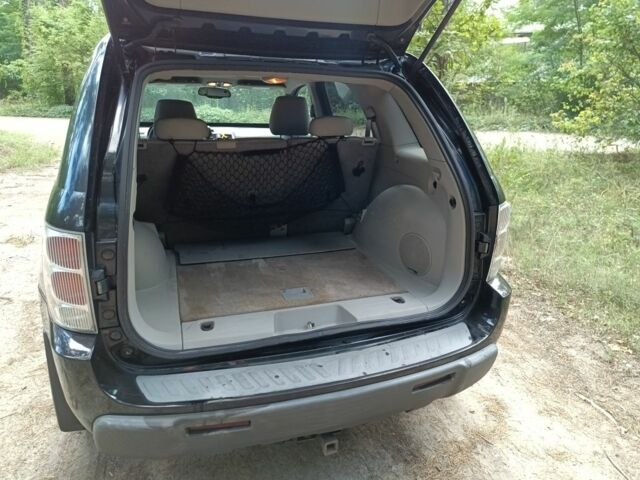 Черный Шевроле Эквинокс, объемом двигателя 3.4 л и пробегом 85 тыс. км за 6300 $, фото 11 на Automoto.ua