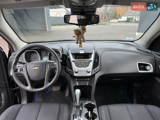 Черный Шевроле Эквинокс, объемом двигателя 2.38 л и пробегом 242 тыс. км за 9000 $, фото 7 на Automoto.ua
