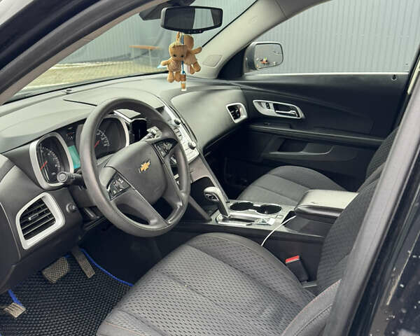 Черный Шевроле Эквинокс, объемом двигателя 2.38 л и пробегом 242 тыс. км за 9000 $, фото 5 на Automoto.ua