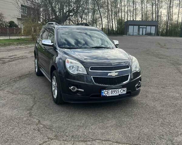 Серый Шевроле Эквинокс, объемом двигателя 2.38 л и пробегом 115 тыс. км за 10500 $, фото 1 на Automoto.ua