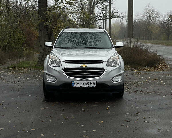 Серый Шевроле Эквинокс, объемом двигателя 2.38 л и пробегом 169 тыс. км за 13400 $, фото 1 на Automoto.ua