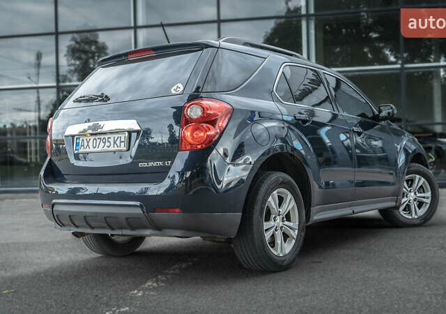 Синий Шевроле Эквинокс, объемом двигателя 2.38 л и пробегом 128 тыс. км за 10700 $, фото 7 на Automoto.ua