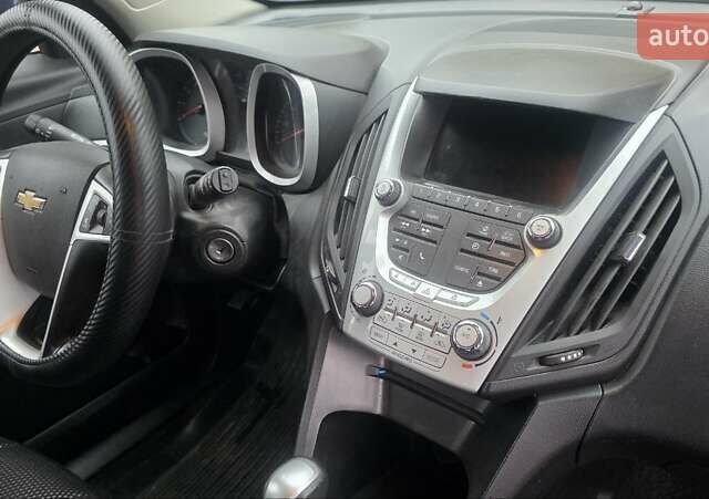 Синий Шевроле Эквинокс, объемом двигателя 2.38 л и пробегом 233 тыс. км за 9950 $, фото 5 на Automoto.ua