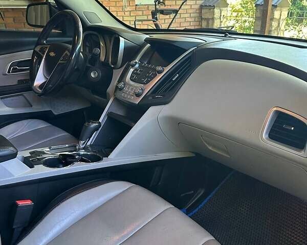 Синій Шевроле Еквінокс, об'ємом двигуна 2.35 л та пробігом 133 тис. км за 12000 $, фото 4 на Automoto.ua