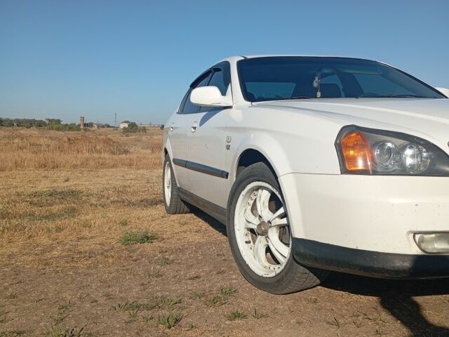 Белый Шевроле Эванда, объемом двигателя 2 л и пробегом 226 тыс. км за 3000 $, фото 8 на Automoto.ua