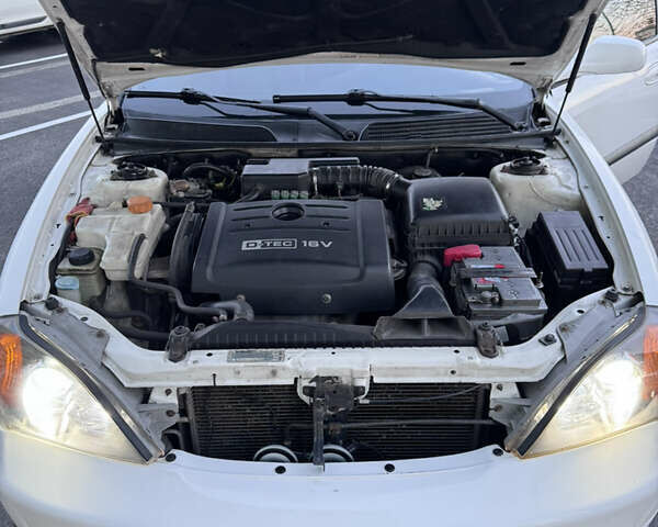 Белый Шевроле Эванда, объемом двигателя 2 л и пробегом 257 тыс. км за 4400 $, фото 14 на Automoto.ua