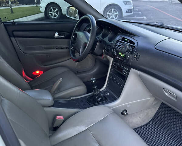 Белый Шевроле Эванда, объемом двигателя 2 л и пробегом 257 тыс. км за 4400 $, фото 11 на Automoto.ua