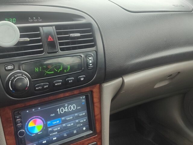 Бежевый Шевроле Эванда, объемом двигателя 2 л и пробегом 356 тыс. км за 1500 $, фото 7 на Automoto.ua